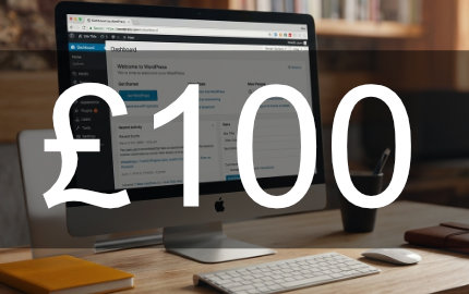 £100 website offer. Computer in background.